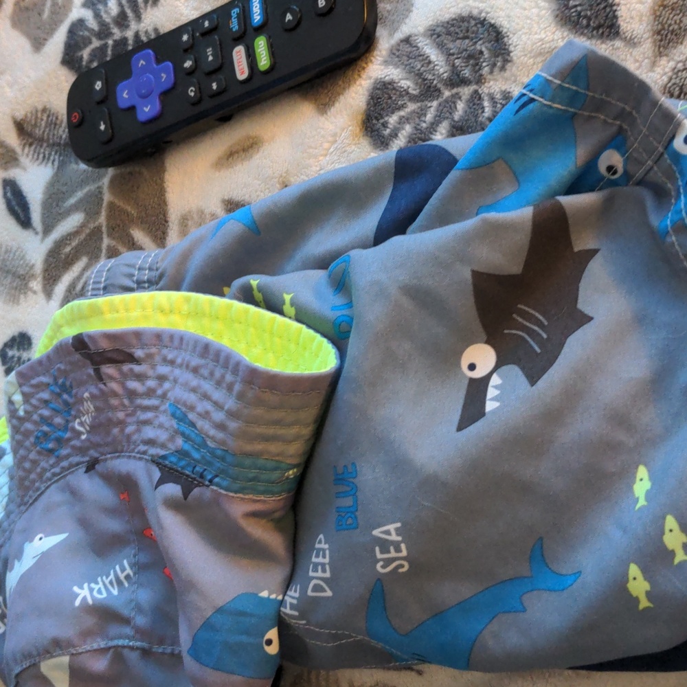 Swim trunks and matching hat